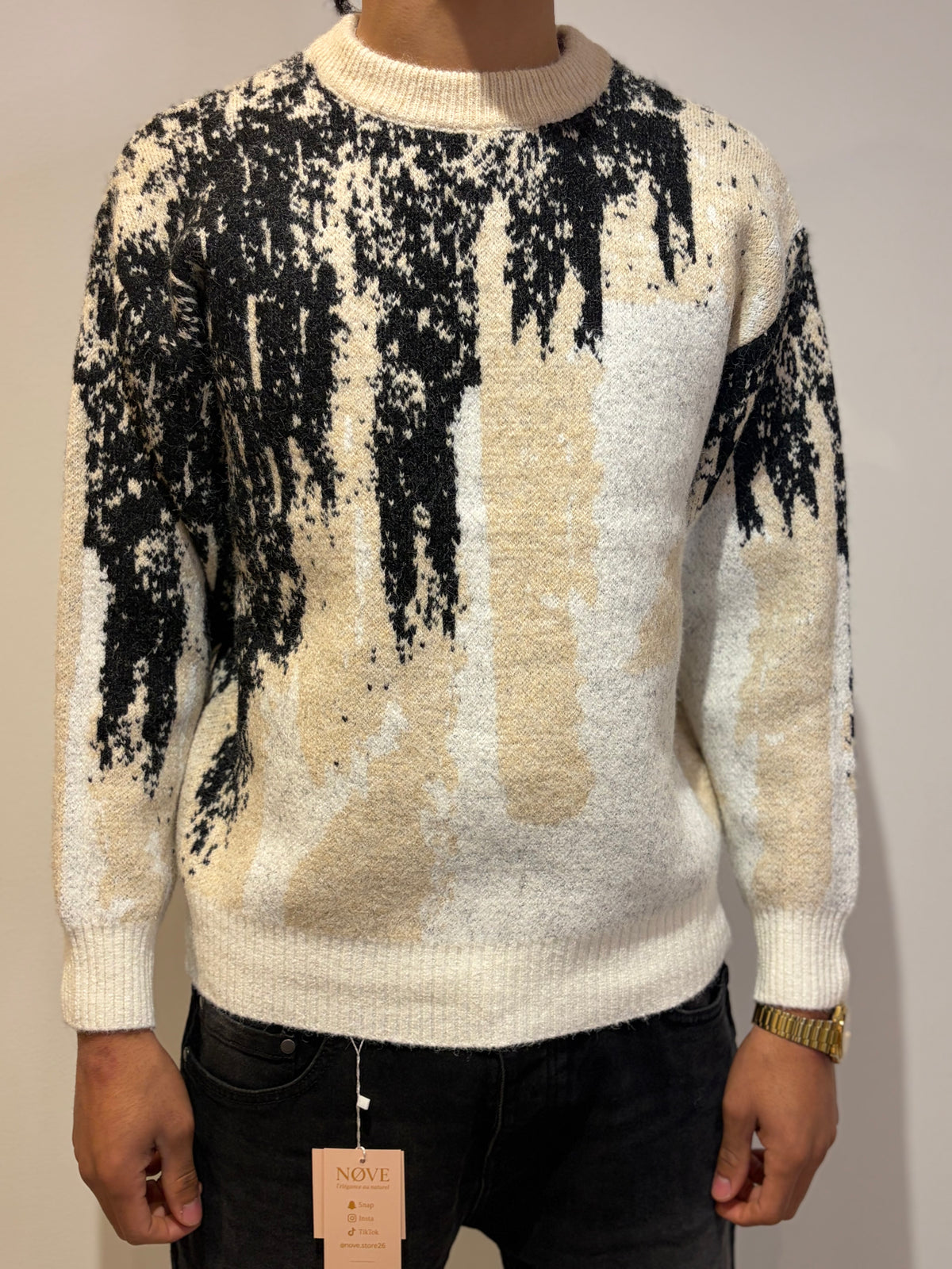 Pull au design abstrait noir et blanc